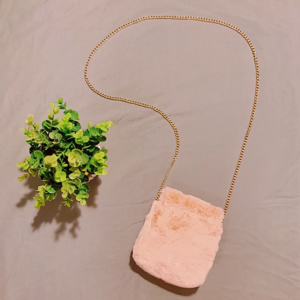 Adorable pink fuzzy cross body